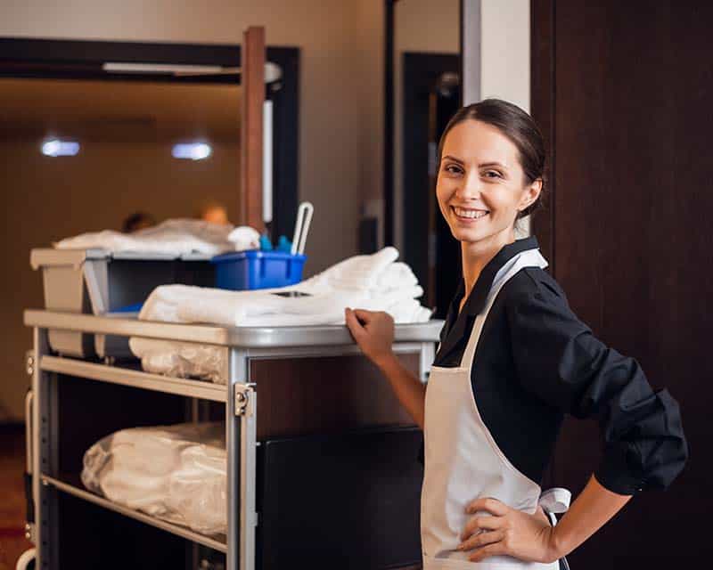 luxury hotel cleaning staff in action